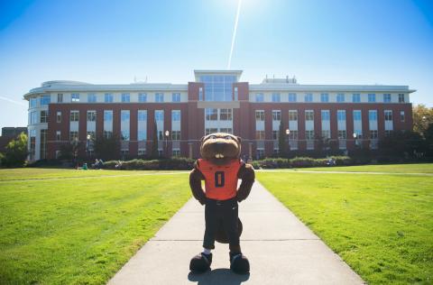 Benny poses in front of the Valley Library